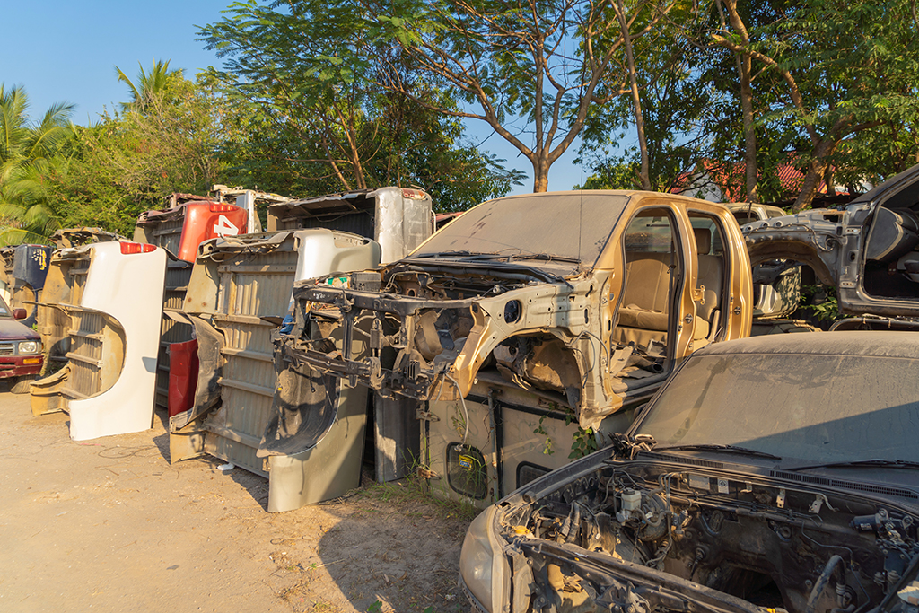Industry factory of broken old cars crash from accidents. Transportation used vehicles.